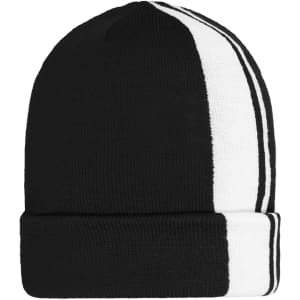 A black and white striped winter beanie with a folded cuff and a logo on the side.