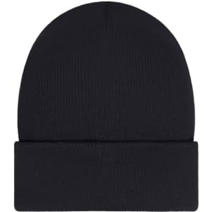 A black beanie with a foldable cuff and a patch, featuring a ribbed texture.