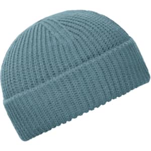 A knitted fisherman beanie in a soft blue colour, featuring a folded cuff and textured design.