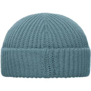 A blue knitted beanie with a ribbed texture, featuring a folded cuff and a logo on the side.