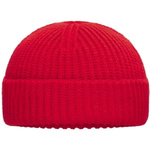 A red knitted beanie featuring a ribbed design and a fold-up cuff. It has a logo on the front.
