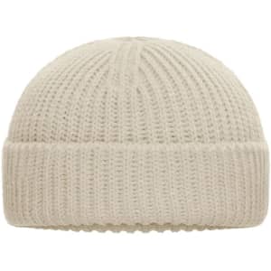 A beige knitted beanie with a ribbed texture and a folded cuff, featuring a logo.