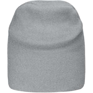 A grey cotton beanie with a soft, knitted texture. It features a logo on the side.