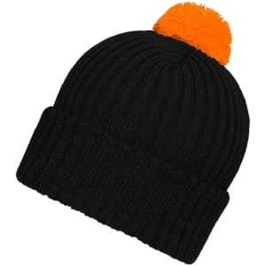 A knitted black beanie with a bright orange pompon on top, featuring a ribbed design and a logo.