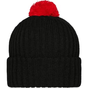 A black knitted beanie with a red pompon on top, featuring a ribbed texture and a folded cuff.
