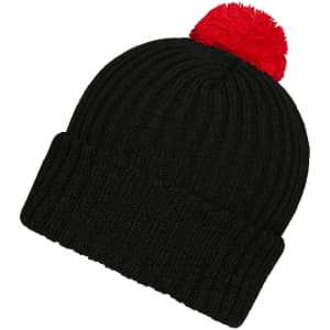 A black knitted beanie with a red pompon on top and a ribbed texture. It features a logo on the side.