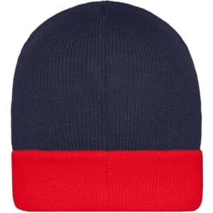 A knitted beanie in navy with a red cuff, featuring a logo on the side.