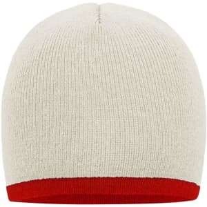 A beanie with a cream body and contrasting red edge, featuring ribbed texture and a logo.