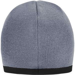 A grey beanie with a contrasting black edge and a ribbed texture. It has a logo on the band.