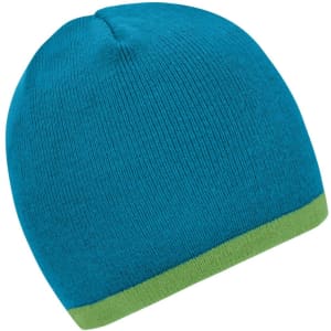 A beanie in vibrant blue with a contrasting green edge, featuring a logo.