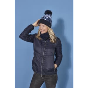 A woman wearing a navy jacket and a matching beanie, complemented by a navy Thinsulate™ neckwarmer.
