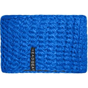 A bright blue crocheted headband with a branded tag. The texture is thick and woven, adding warmth and style.