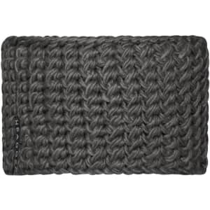 A dark grey crocheted headband with a textured pattern and a discreet logo.
