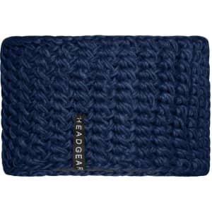 A blue crocheted headband featuring a textured pattern and a branding label.