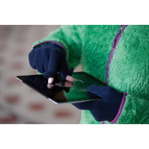Touch-screen fleece gloves in navy, being used to interact with a tablet, paired with a green fleece jacket.