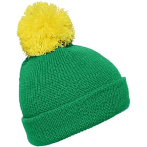 A green beanie with a fluffy yellow pompon on top. Features a textured knit design and a folded cuff.