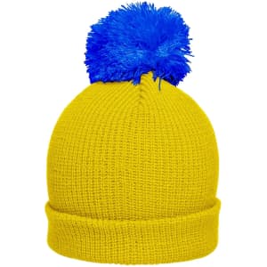 A yellow knit hat with a blue pompon on top, featuring a rolled brim and a logo on the side.