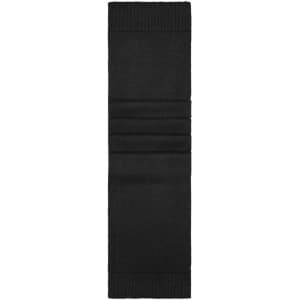 A black knitted scarf with ribbed edges, featuring a textured pattern throughout. It has a logo.