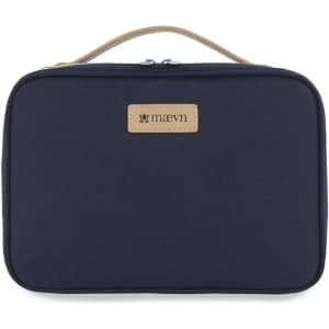 A navy blue pouch with a tan handle and a logo patch, featuring a zip closure.