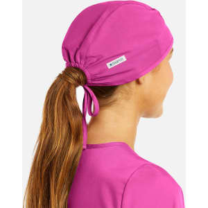 A unisex scrub cap in vibrant pink, featuring adjustable ties and a small logo.