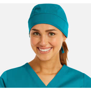 A unisex scrub cap in vibrant teal, featuring a simple design and a logo on the front.