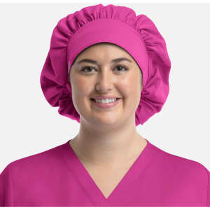 A unisex bouffant scrub cap in vibrant pink, featuring a gathered design and a comfortable fit.