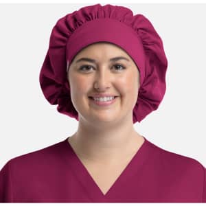A unisex bouffant cap in a rich burgundy colour, featuring a gathered design and smooth finish.