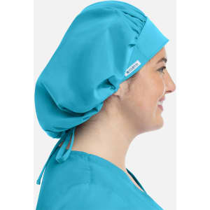 A unisex bouffant scrub cap in bright blue, displayed on a person's head from the side.