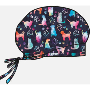A printed unisex bouffant cap featuring a colourful pattern of dogs and paw prints on a dark background.