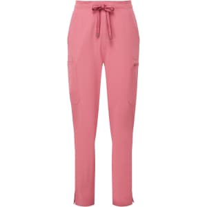 Pink women's cargo pants with a drawstring waist and side pockets, featuring a logo on the fabric.