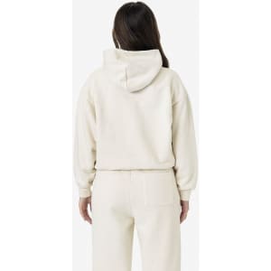 A cream-coloured garment dye plush fleece pullover hoodie with a hood, worn by a model from the back.