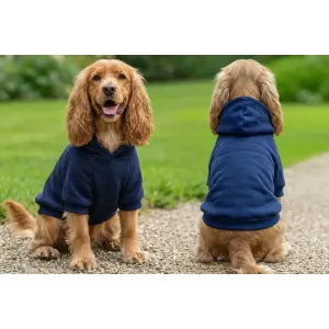 A navy blue hoodie designed for dogs, shown on two Cocker Spaniels in a grassy outdoor setting.