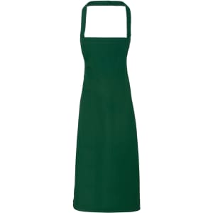 A deep green organic cotton bib apron featuring an adjustable neck strap and a simple design.