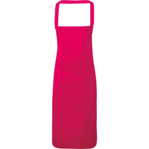 A bright pink 100% organic cotton bib apron with adjustable straps and no visible branding.