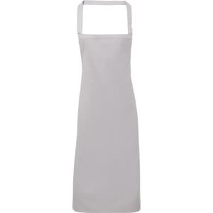 A grey 100% organic cotton bib apron with straps and an unembellished design. It has a simple, clean look.