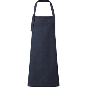 A dark denim bib apron with a tie at the neck and a simple, classic design. It features a logo.