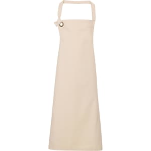 A beige heavy cotton canvas bib apron with an adjustable neck strap and a grommet detailing.