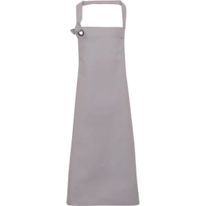 A grey heavy cotton canvas bib apron with a simple design and an adjustable neck strap. It features a logo.