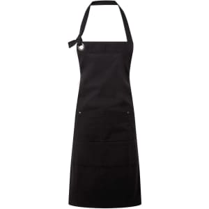 A black heavy cotton canvas apron featuring multiple pockets and a tie-neck design. It includes a logo.