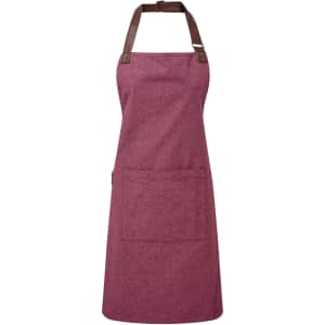A burgundy bib apron featuring a brown neck strap and adjustable ties, with a front pocket and branding.