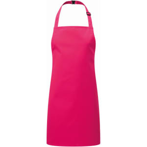 A pink kids' bib apron with a halter neck design and adjustable strap. It features a logo on the front.