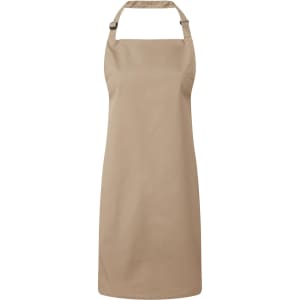 A beige bib apron with a classic design, featuring an adjustable neck strap and a logo. Suitable for chefwear.