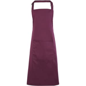 A maroon bib apron with a front pocket and adjustable neck strap, featuring a logo.