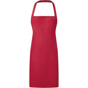 A red bib apron with a neck strap and straight design. It features a logo or branding on it.