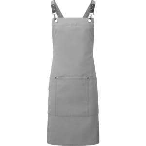 A grey cross-back bib apron featuring adjustable straps and a front pocket, with a logo present.