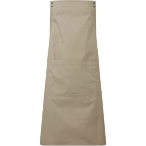 A beige custom apron featuring a large front pocket and snap button detailing, with a logo included.