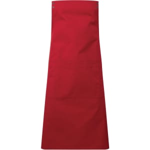 A red custom apron with a large pocket at the front and metal snap buttons at the top. Brand logo present.