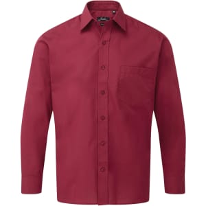 A long-sleeved button-up shirt in a rich burgundy colour, featuring a single chest pocket and a collar.