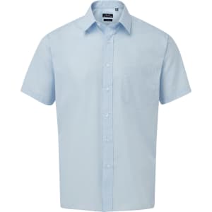 A light blue short-sleeve button-up shirt with a collar and a single chest pocket. It features a logo on the label.