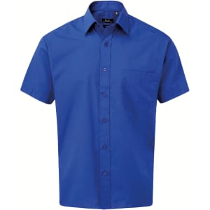 A blue short-sleeved button-up shirt featuring a chest pocket and a branded label.